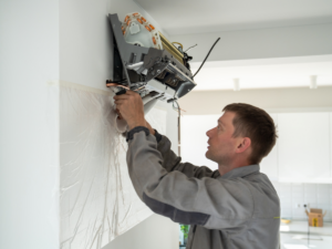 HVAC tech installing properly sized mini split