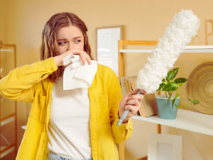 Woman suffering from allergies because of dust buildup