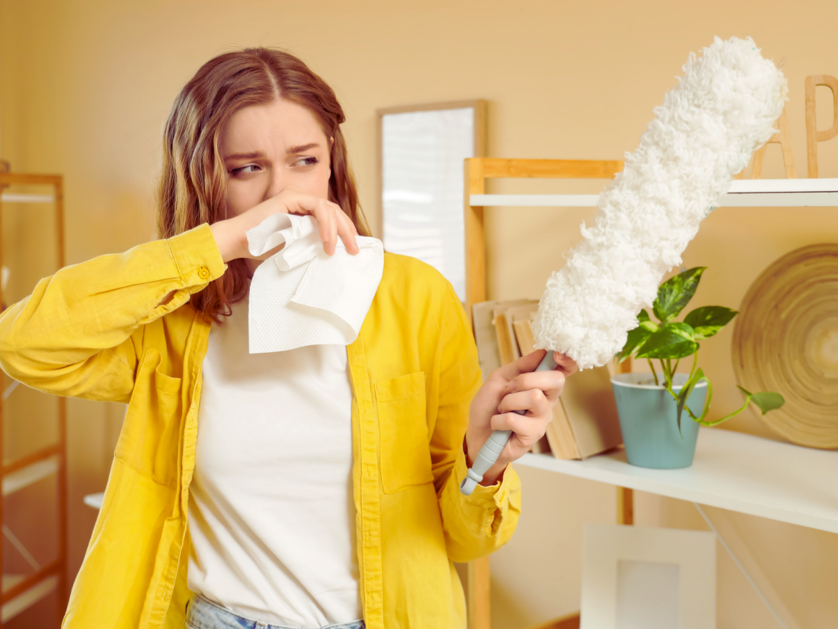 Woman suffering from allergies because of dust buildup